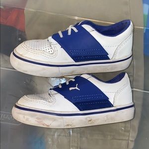 White and blue puma shoes